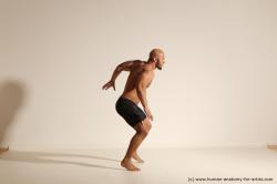 Underwear Man Black Muscular Bald Dancing Dynamic poses Academic